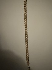 9ct yellow gold Solid curb link bracelet 71/2 inches 9.1grams 6.6mm wide.