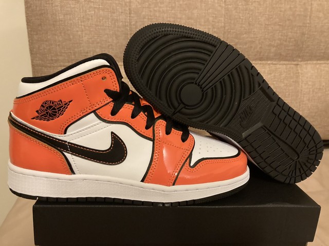 orange jordan 1 grade school