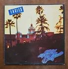 The Eagles - Hotel California 1976 VINYL LP WITH VINTAGE POSTER VGC