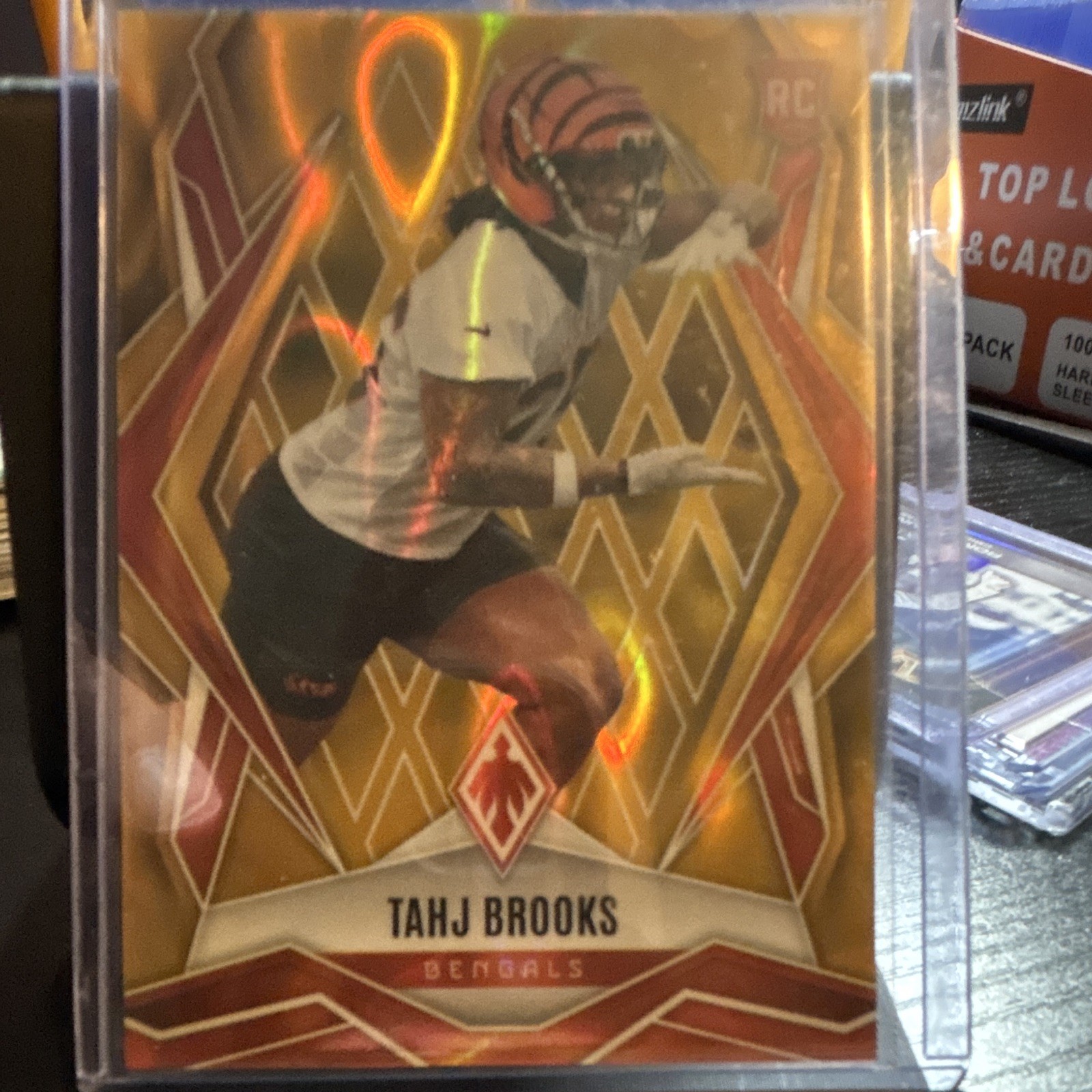 2025 Panini Phoenix Tahj Brooks Gold Prizm RC #244 Serial Numbered 08/10 Bengals