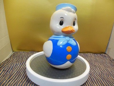 Vintage Roly-Poly duck. Soviet musical doll.