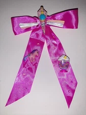 Hair Bow that features miniature toys and lights up!