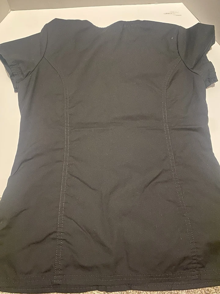 Paquete de 5 tops exfoliantes (XS/S) y 3 pantalones exfoliantes (XS/S) - usados Foto 3 de 4