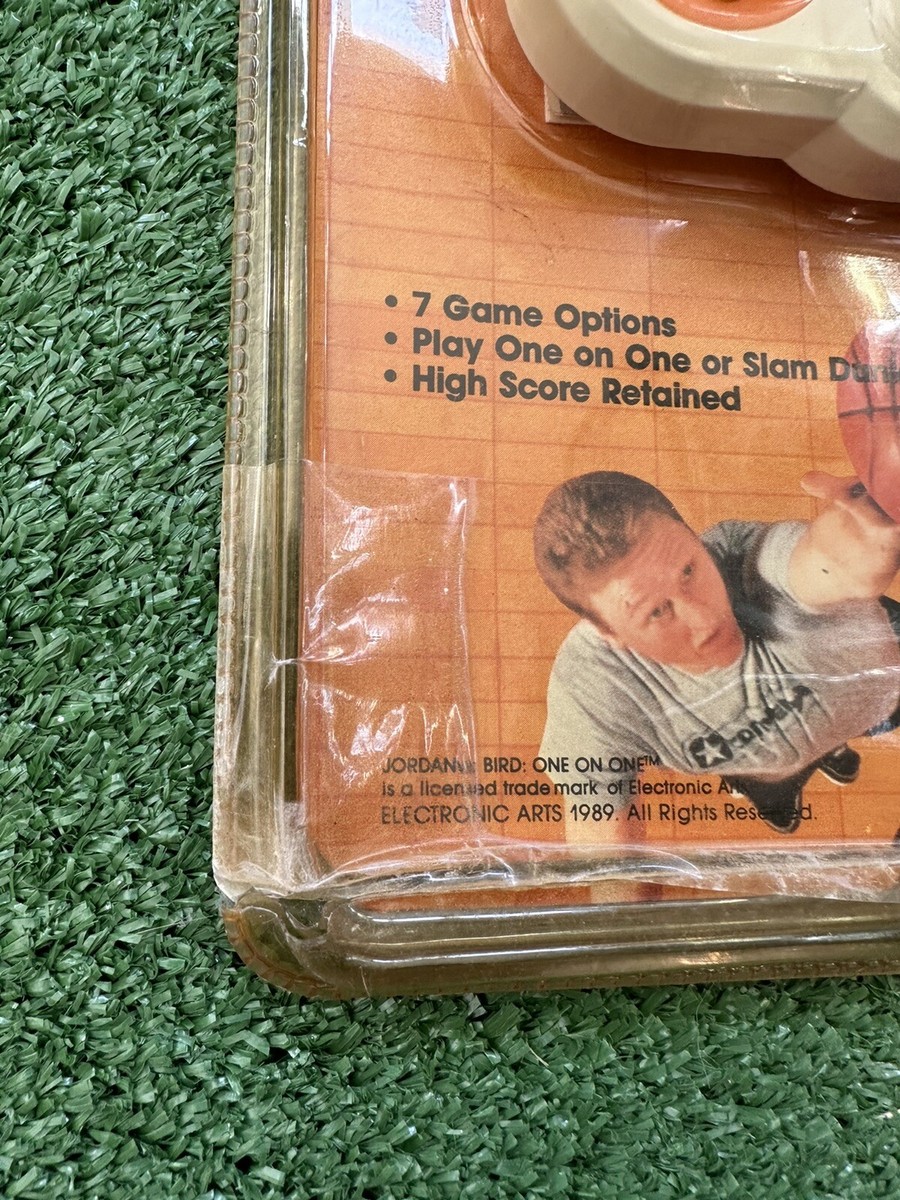 Vintage 1988 Jordan Vs Bird One on One Handheld Tiger Game Vintage 1988 Jordan Vs Bird One on One Handheld Tiger Game