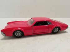 POLITOYS EXPORT OLDSMOBILE TORNADO IN RED 1:43