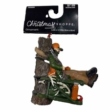 Christmas Shoppe Orange Cap Hunter w Rifle on Tree Trunk Christmas Ornament NWT