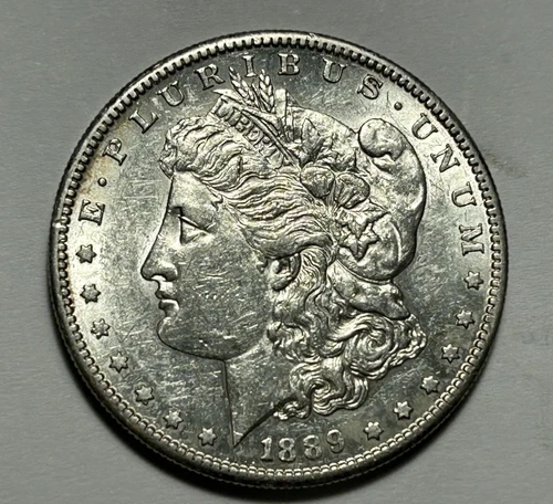 1889 S MORGAN DOLLAR AU