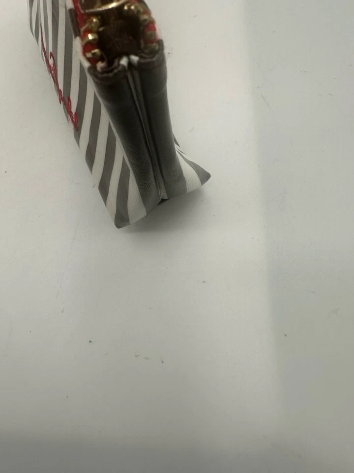 BOLSA DE COSMÉTICOS CENTENARIA HENRY BENDEL BOLSA DE MAQUILLAJE Foto 4 de 4