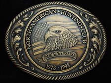 QF13143 VINTAGE 1998 NORTH AMERICAN HUNTING CLUB BRASSTONE BELT BUCKLE