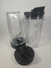 Lot of 2 Nutri Ninja 24 Oz Blender Cups with Blade and 2 Lids New OEM
