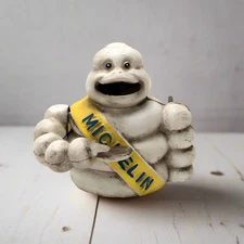 Tire Man Cast Iron Mechanical Coin Bank Painted Antique Finish (4.5" x 5.5")