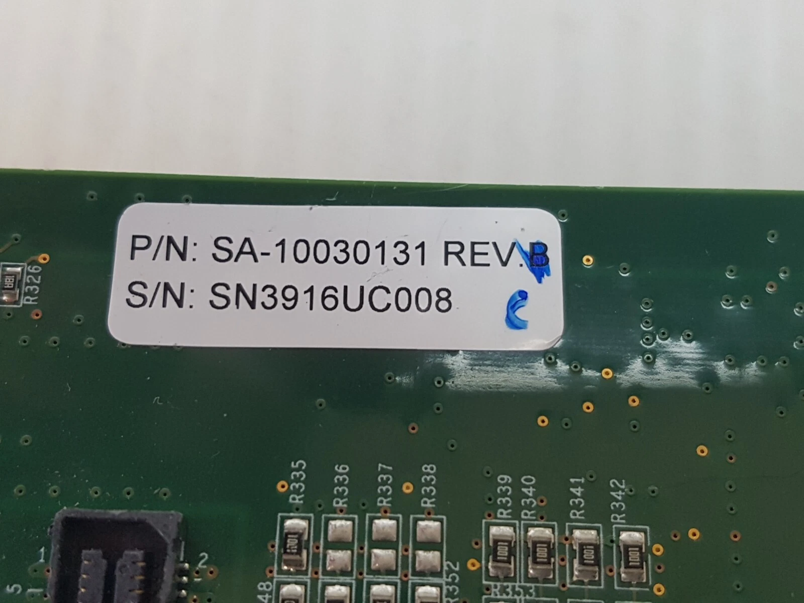 Part-number label SA-10030131 REV B with revision hand-marked C