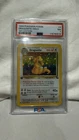 1999 POKEMON FOSSIL 1ST EDITION  #4 DRAGONITE-HOLO PSA 7