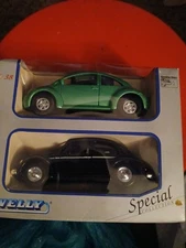 Welly Model  9748  & 9049 Volkswagen Green New Beetle & Black Kafer Beetle