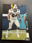 Zach Thomas Autographed 5x7 Miami Dolphins HOF (scratch on photo)