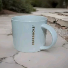 Starbucks Coffee Mug 2012 White Gold Letters Red Trim Around Bottom 16 oz Tea