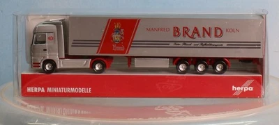 Herpa 065306, Spur N, MB Actros Koffer-Sattelzug BRAND - Bild 1 von 4