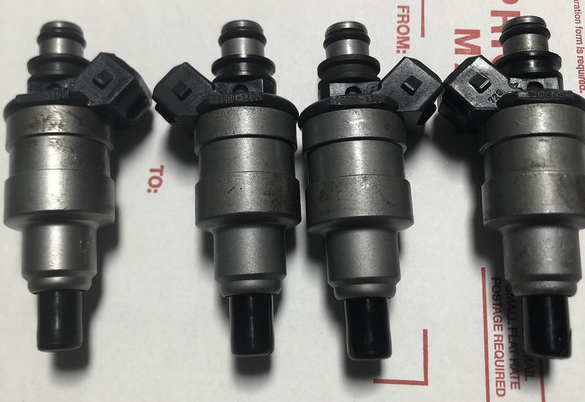 **「MU」** Denso 195500-1300 Fuel Injectors. Set of 4. For 86-94 Mazda and