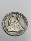 1859 O SEATED LIBERTY DOLLAR VG Details