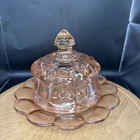 Mosser pink depression glass butter dish with a Cherry and Cable pattern.