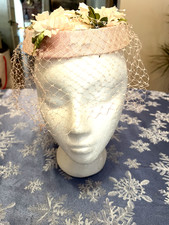 Charming vintage hat with flowers and veil