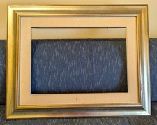 Cornice in legno, argentata/dorata