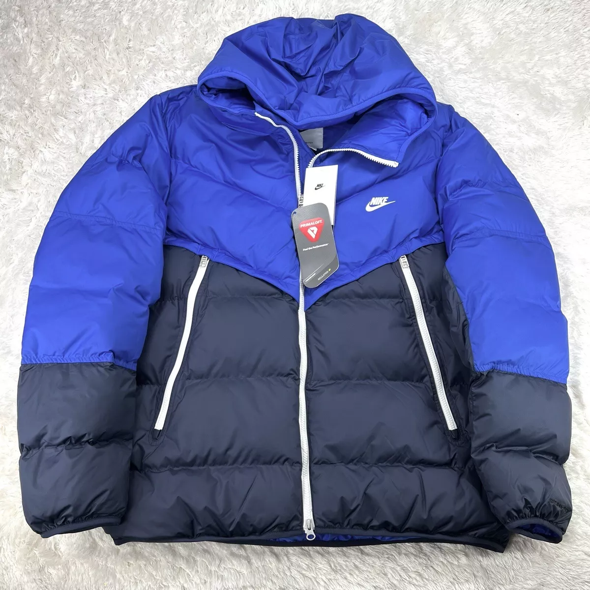 Nike puffer hotsell jacket blue