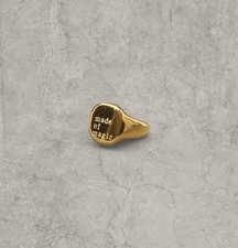 Vintage style stainless steel signet ring in gold colour . Engraved. One size.