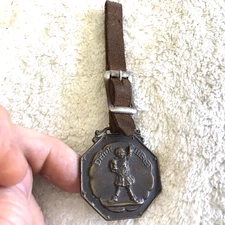 HIRES ROOT BEER VINTAGE UGLY KID WATCH FOB, CIRCA 1900