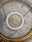 Silver 90% 1957 D Franklin Half Dollar comes in a plastic case   T-259
