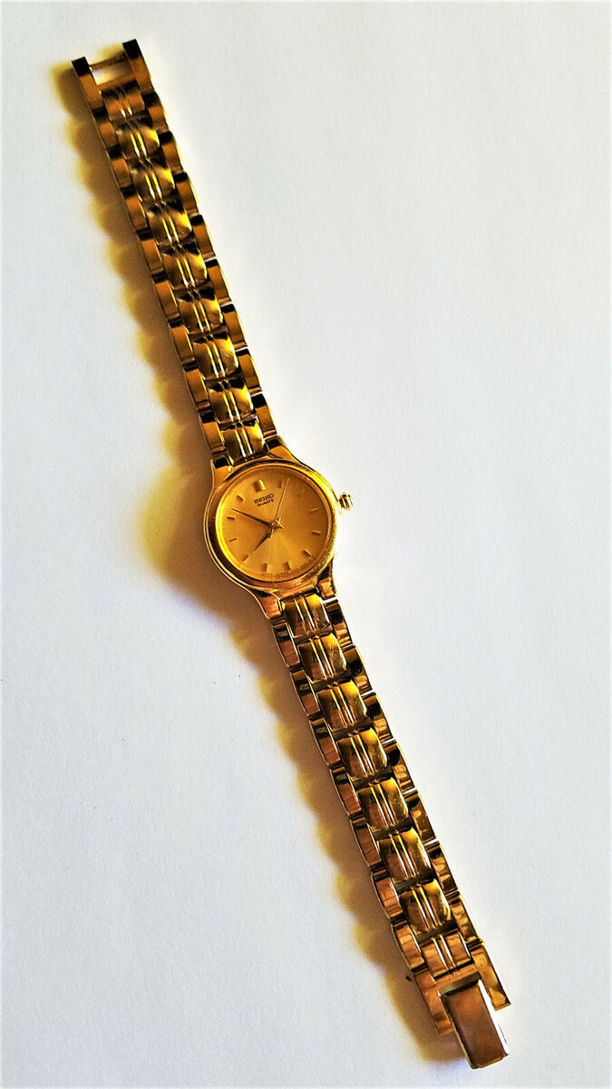 Seiko Womens V401-1111 Quartz Watch Gold Bracelet Band Dial Seiko Womens V401-1111 Quartz Watch Gold Bracelet Band Dial