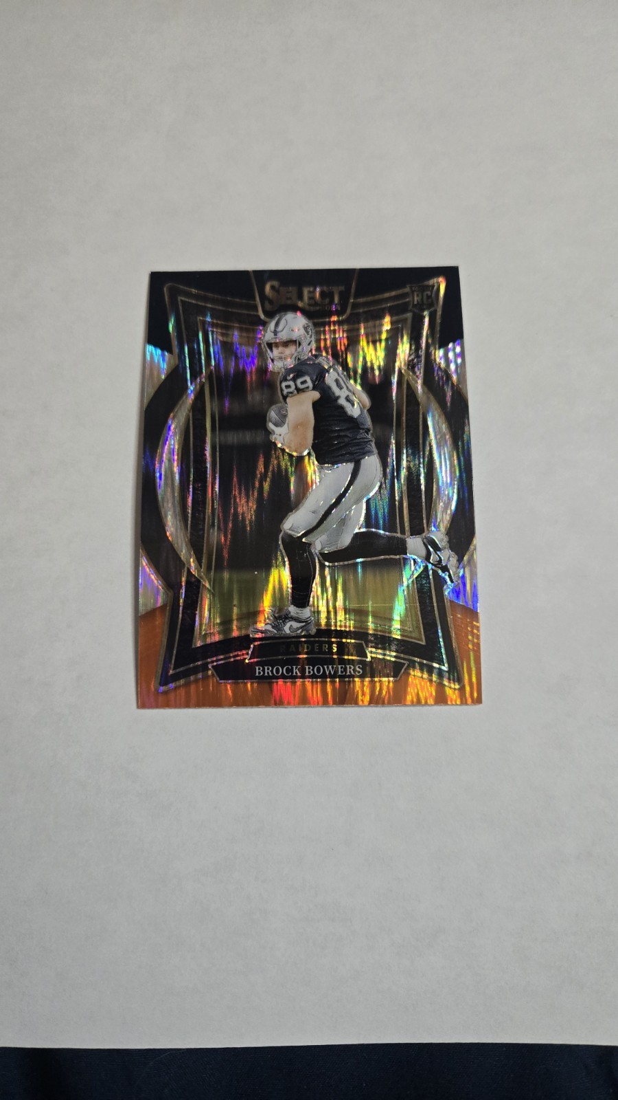 2024 Panini Select - Concourse Brock Bowers #31 Black & Orange Shock Prizm (RC)