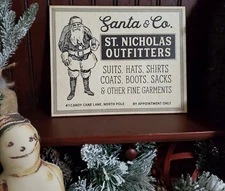 OLD VINTAGE PRIMITIVE STYLE CHRISTMAS CLOTHES FOR SANTA ST. NICK OUTFITTERS SIGN