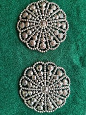 Georgian Cut Steel Brooches, Two, each 2 inches wie with a loop on the back of e