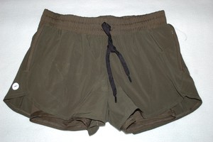 olive running shorts
