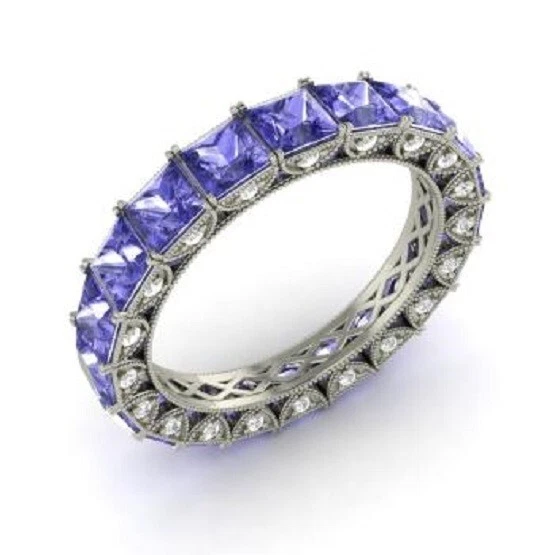 Anillo de compromiso de eternidad de tanzanita simulada princesa de 2 quilates enchapado en oro blanco de 14 quilates Foto 3 de 3