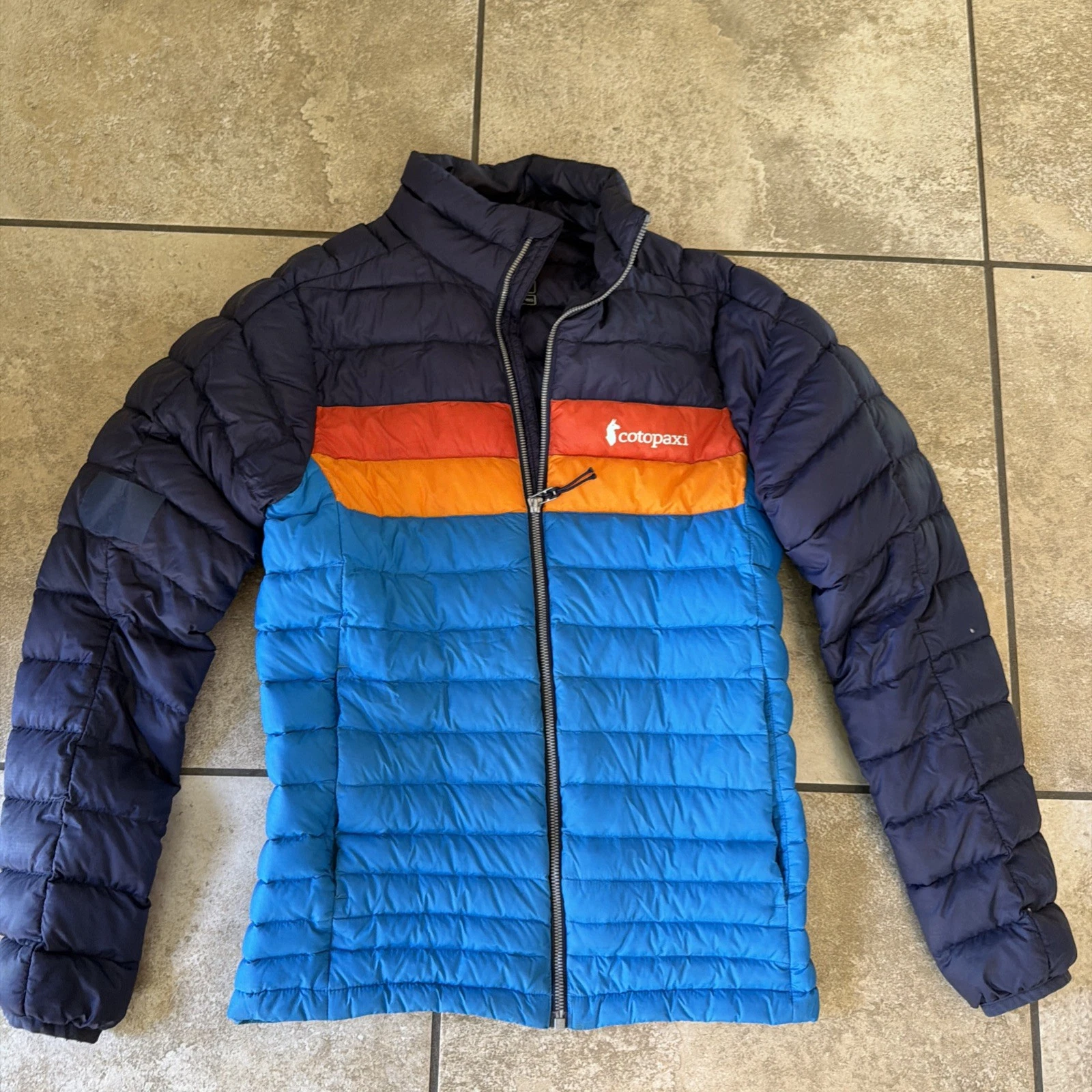 Cotopaxi Gear For Good Fuego Down Puffer Jacket Blue Orange Mens XS
Opens in a new window or tab