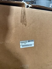 260010-9uf0d  OEM Nissan headlight (Drivers Side)
