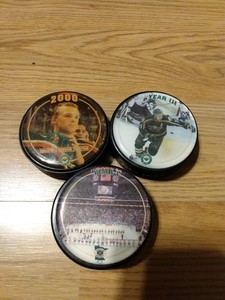 3 Collector Hockey Pucks