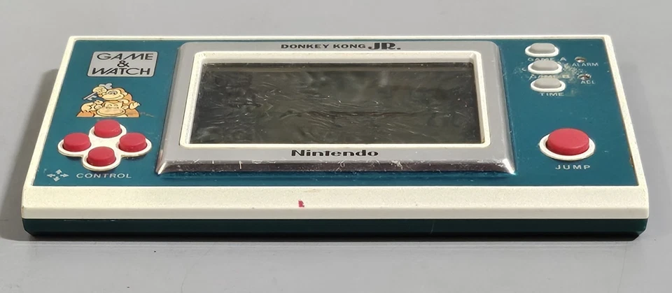 Juego y reloj Nintendo Donkey Kong Jr. 1982 vintage probado portátil RARO Foto 3 de 4