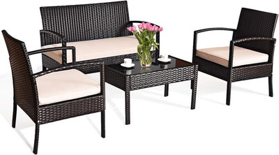 Stylish 4-Piece Rattan Patio Set with Cushions & Glass Tabletop