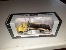 NIB 1/64 Yellow International IH 8600 Rollback Tow Truck SpecCast