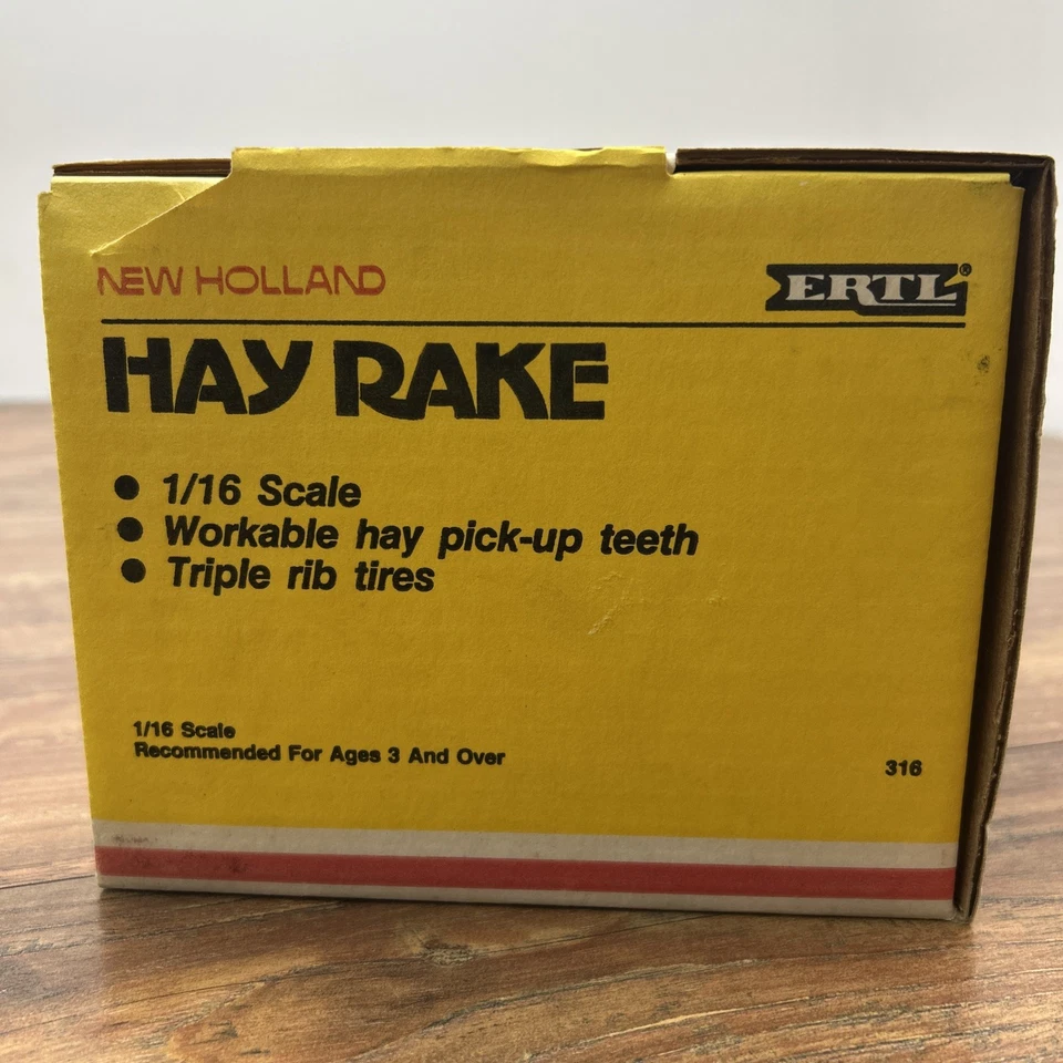 ERTL New Holland 1987 vintage, rastrillo de heno, #316, escala 1/16, hecho en EE. UU., nuevo Foto 4 de 4