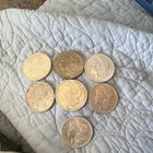 Lot of 7 Morgan Silver Dollars $1
