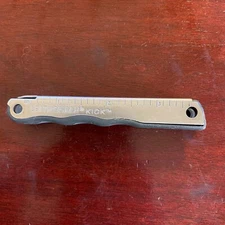 Parts from Stainless Leatherman Kick: One (1) Part for repairs or mods