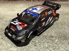 SCX 1/32 Scale 4x4 Toyota Yaris WRC - Rally Swede TOP with lights U10529X300