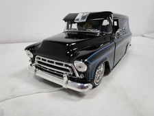 JADA 1/24 STREET LOW BLACK 1957 CHEVY SUBURBA...