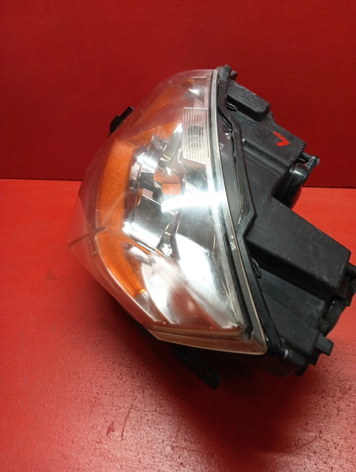 Lámpara halógena de faros de conductor izquierda TYC mercado de accesorios para Cadillac CTS 2008-2014 Foto 3 de 4