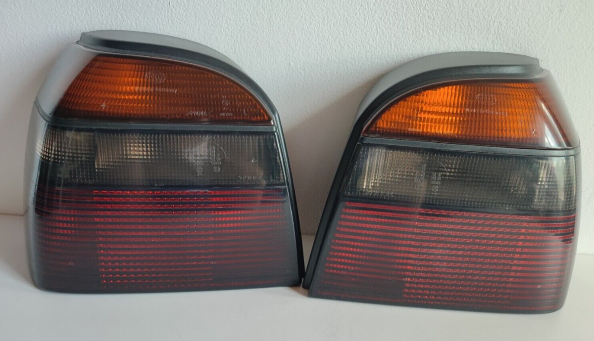 VW Golf Mk3 Smoked Facelift Tail Lights | HELLA | 1H6945111