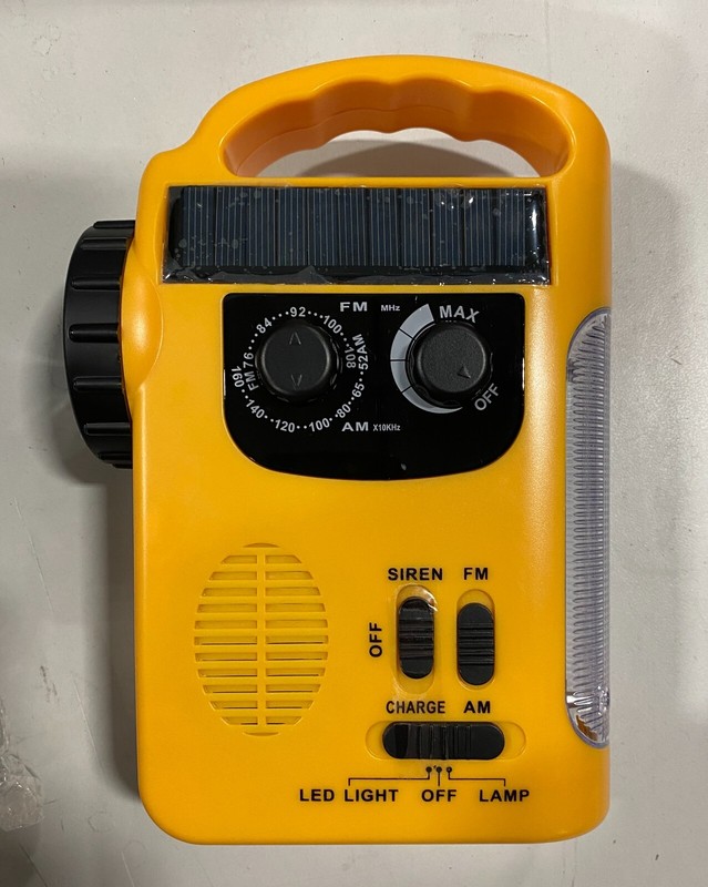 Portable Dynamo Solar Radio with Flashlight Attached